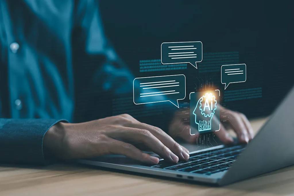Business owner using Business Blueprint AI Advantage on laptop to optimize operations.