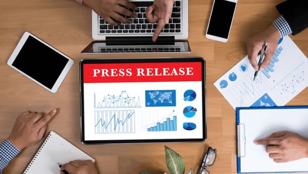 PR professional drafting a press release for business promotion and brand awareness