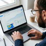 A man reviewing a conversion rate optimization strategy dashboard on his laptop.